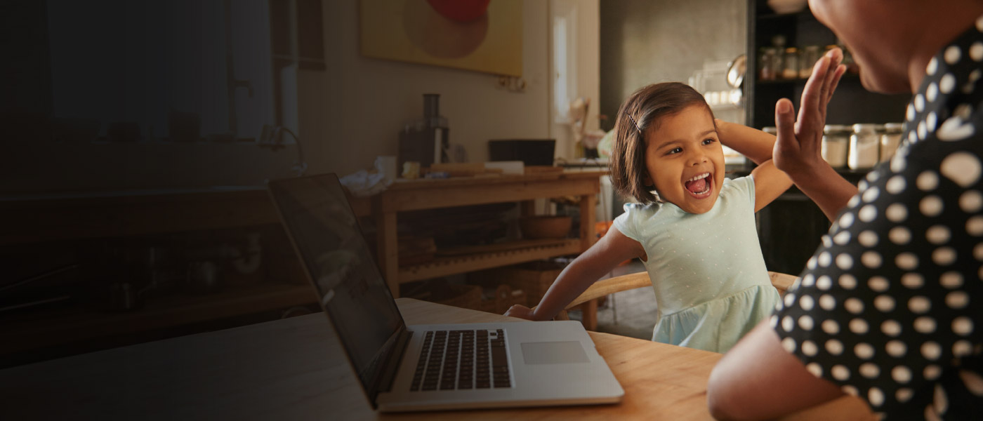 Happy parent and child Foresters members high fiving