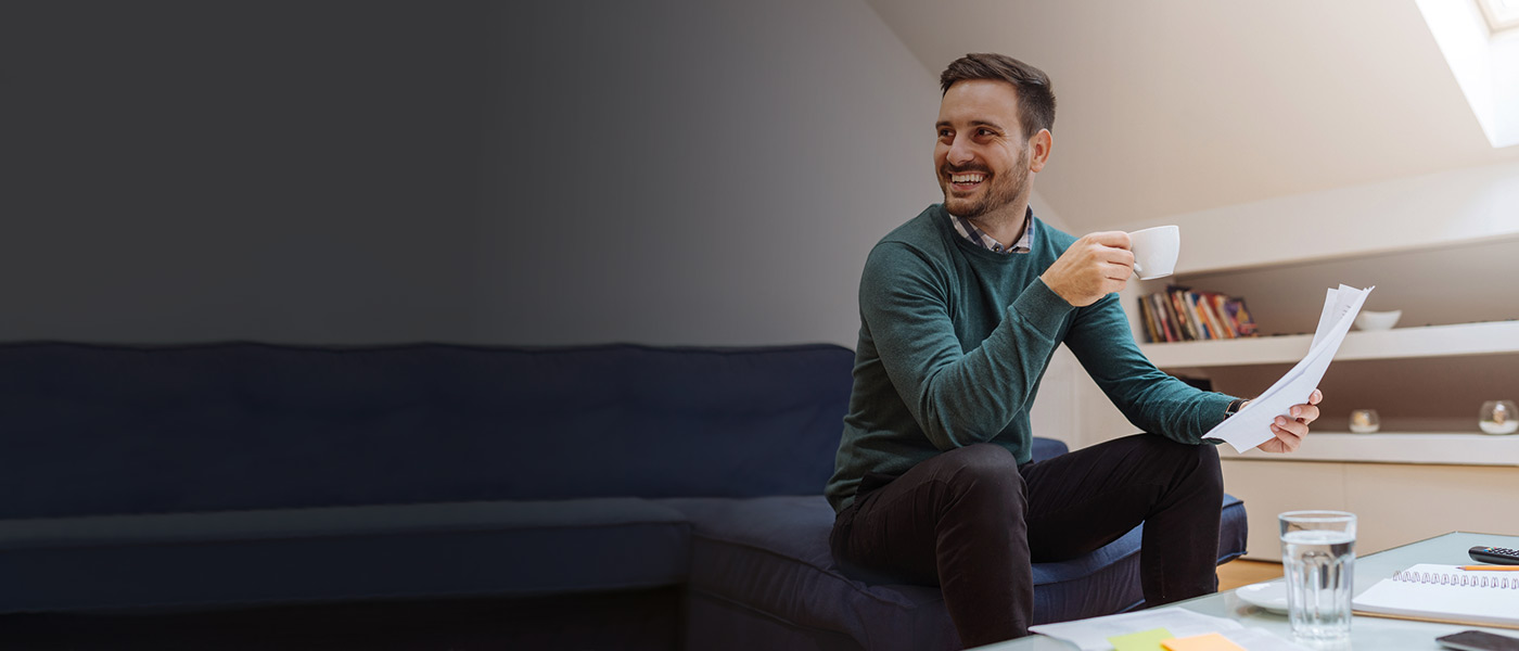 Customer reading the latest Foresters investment bulletin