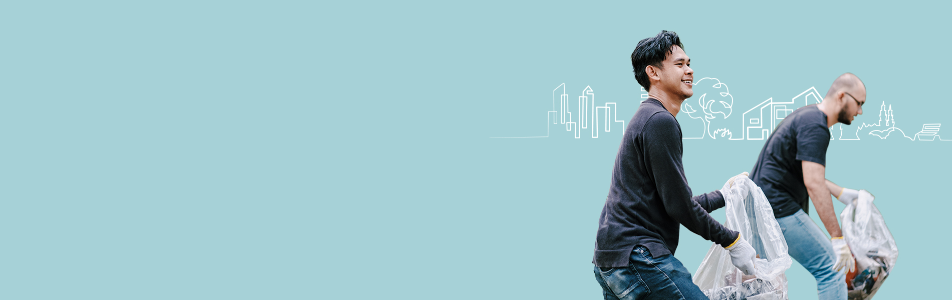 Two voluteers cleaning up